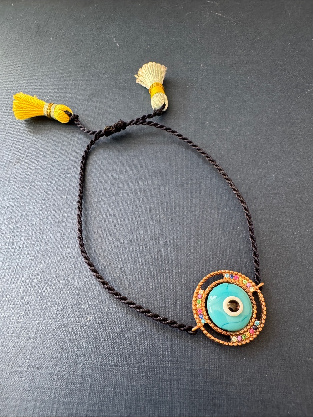 Evil eye charm bracelet-Turquoise and rainbow crystal medallion, adjustable cord